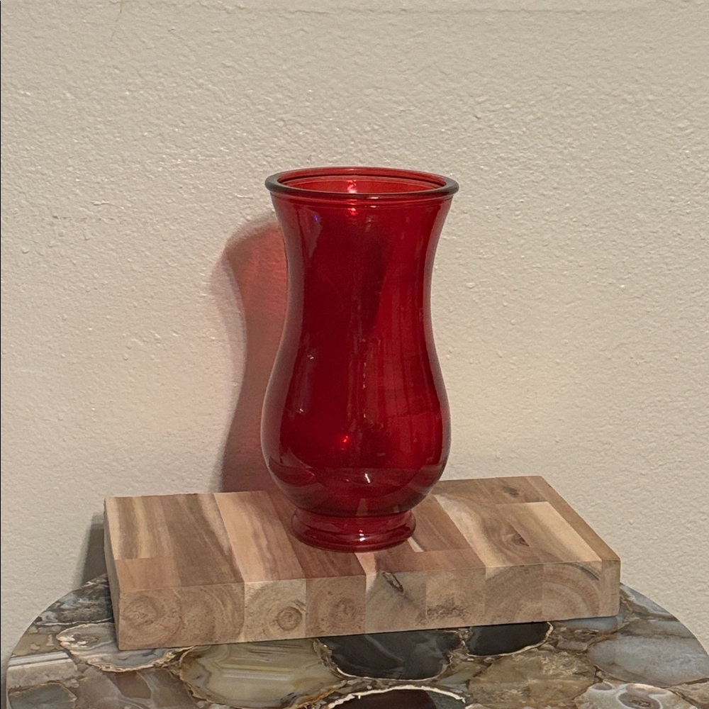 Ruby Red glass vase with varying sizes of glass shapes